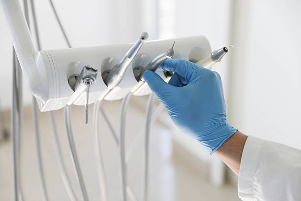 Professional Tooth Extraction technician working in Altamont, IL